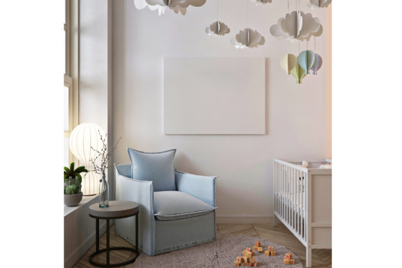 Poster Mockup in Baby Room with Armchair